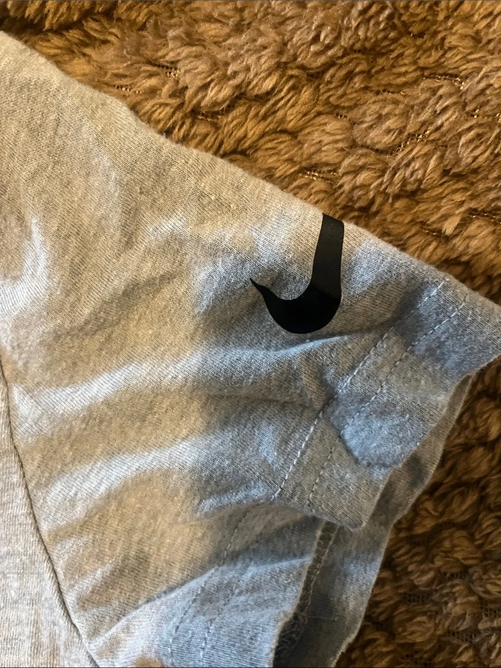 Nike Gray Tee with Orange Swoosh and Black Text